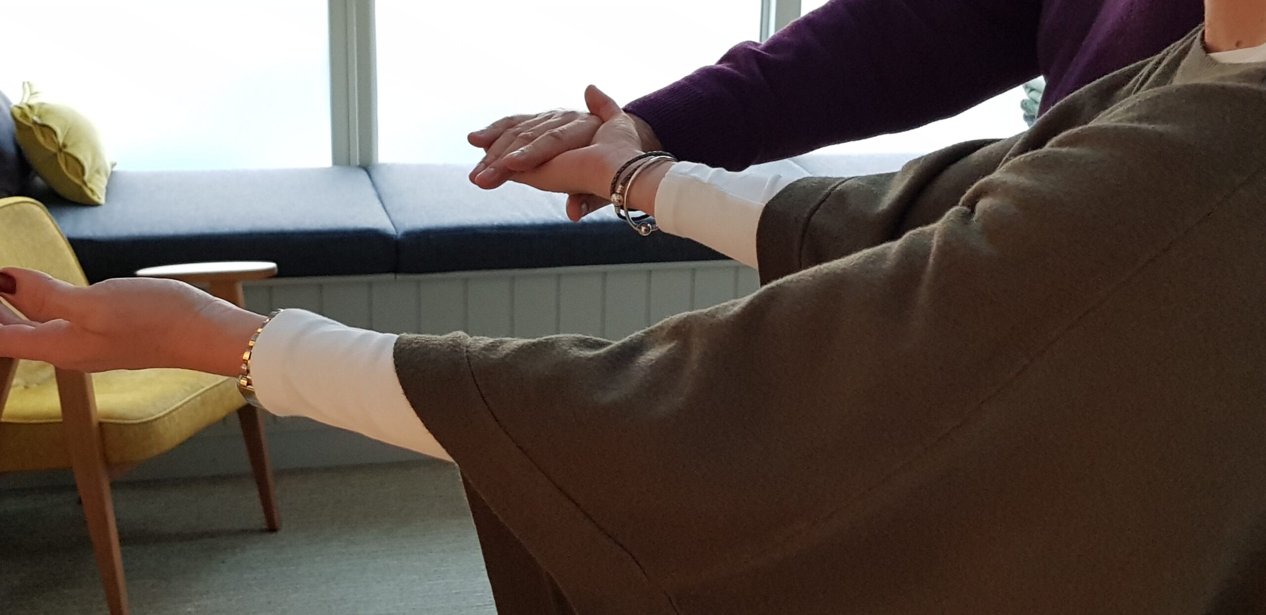 Two participants working with their hands during an exercise