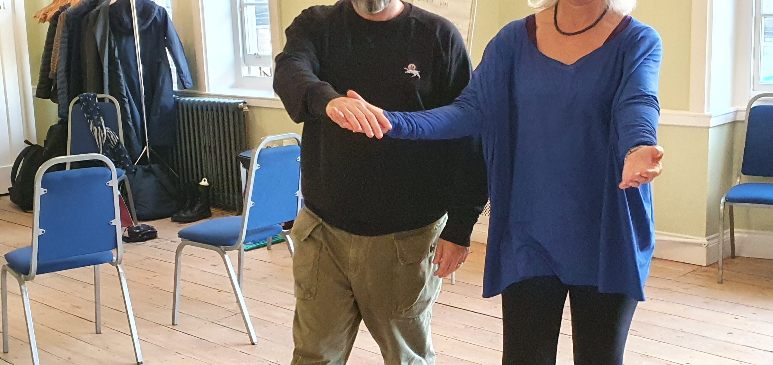 Paul guiding a participant through a hands exercise